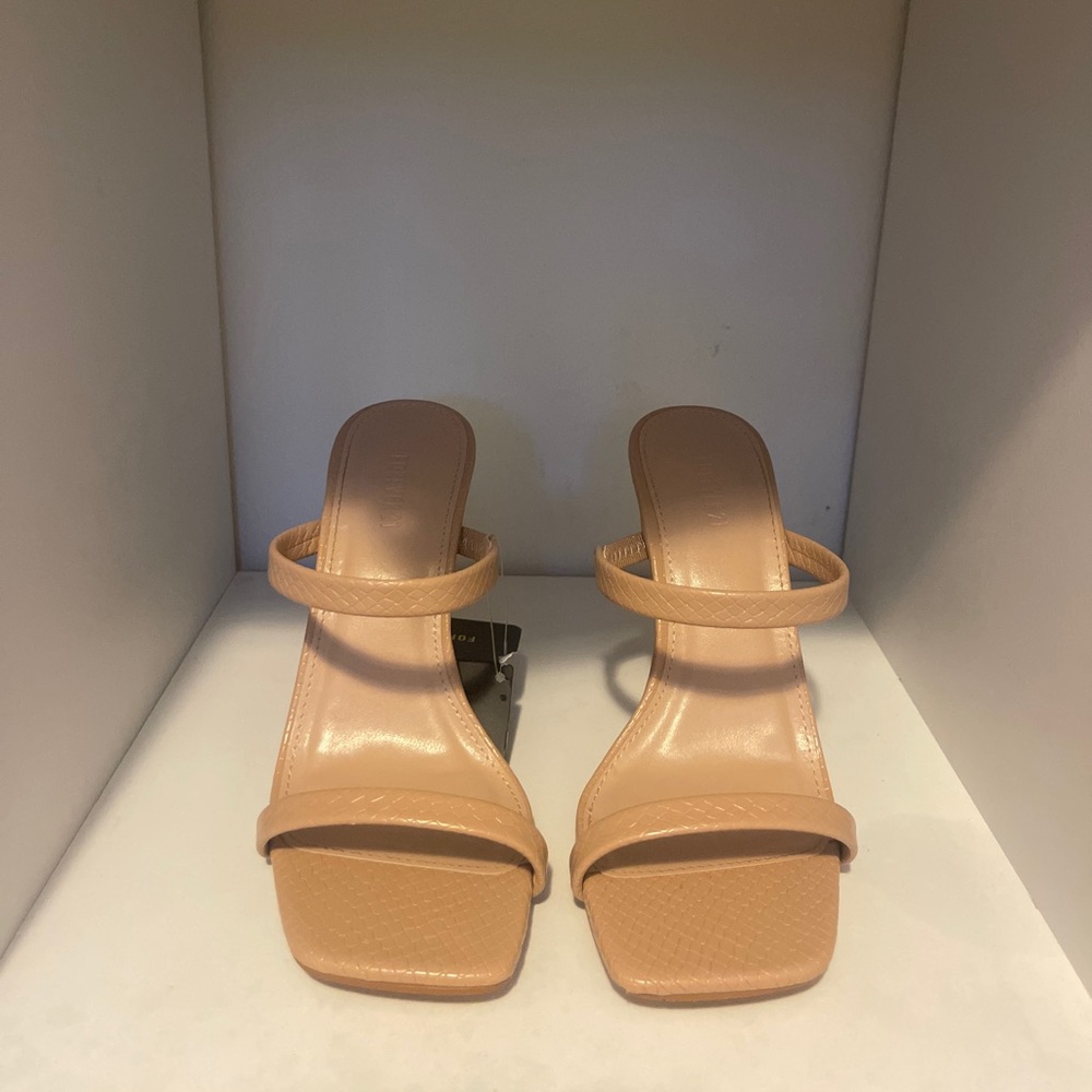 NUDE CROC HEELS.